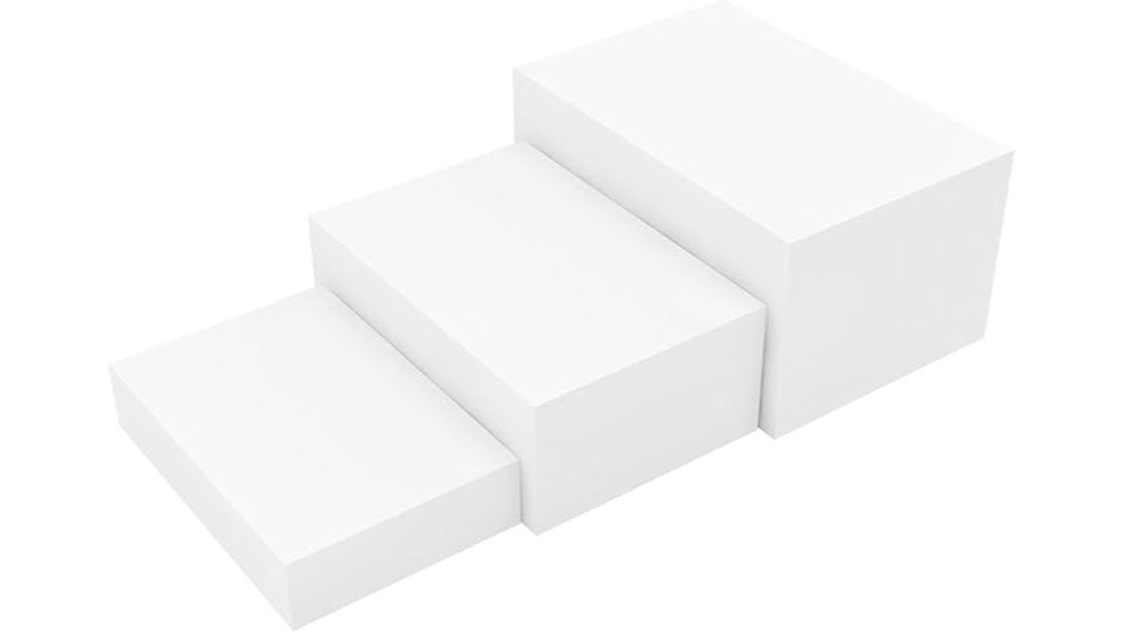three white acrylic risers