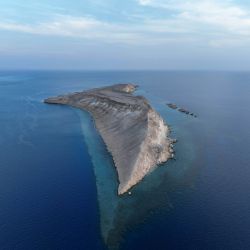 an island in the middle of the ocean
